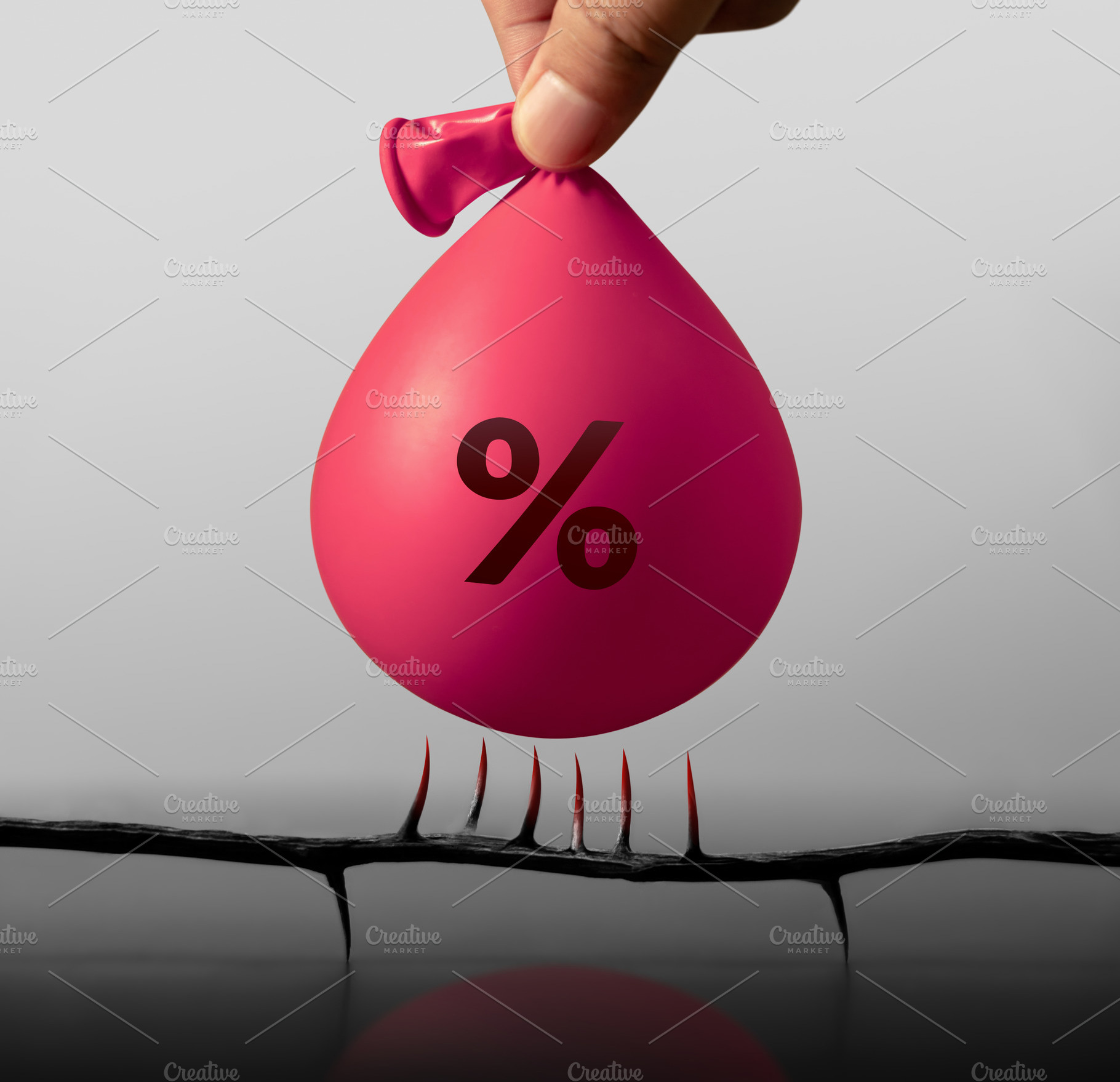 Water filled Balloon labeled Percentage dangerously above spikes, a Photo by salmon.black