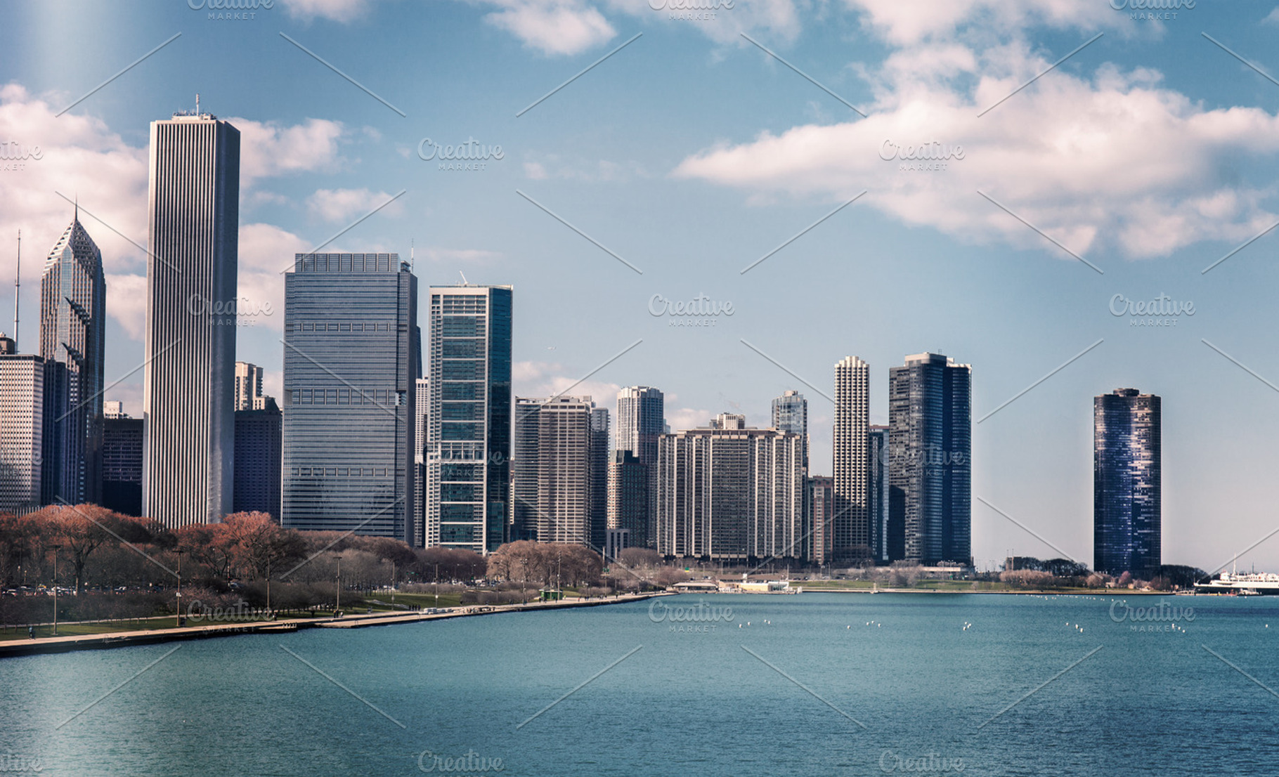 Chicago skyline in sunny spring day, an Architecture Photo by Designifty