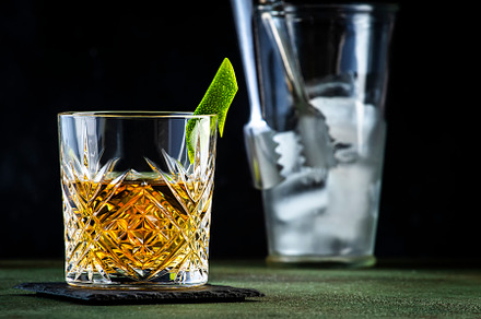 White negroni, alcoholic cocktail with dry gin, white vermouth a, a Food & Drink Photo by 5PH