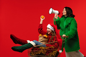 Woman announces with megaphone while, a Holiday Photo by Elena Vagengeim