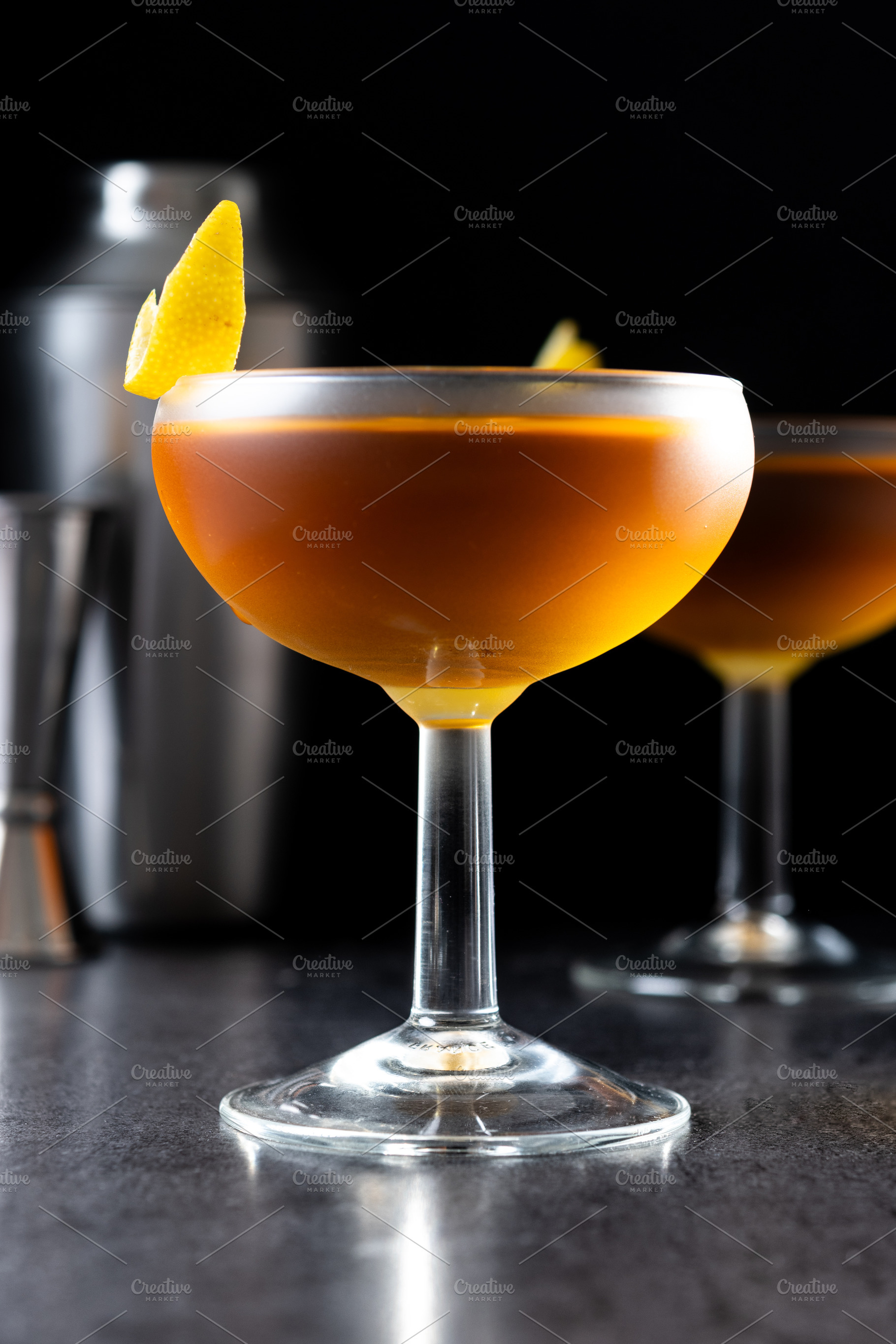 Paper plane cocktail on black slate background, a Food & Drink Photo by etorres69