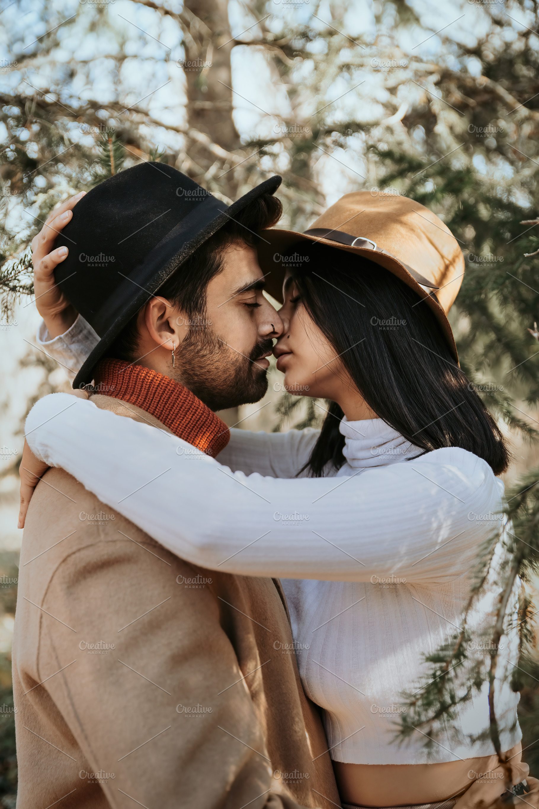 Young couple about to kiss in an aut, a Person Photo by Perpis