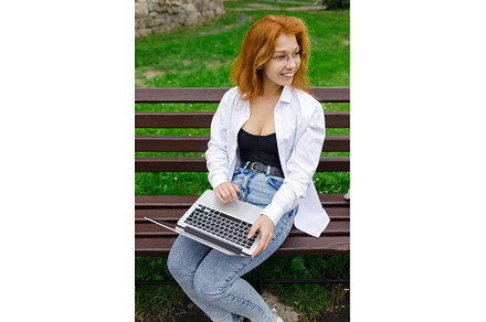 Young redhead female student with, a School & Education Photo by serkum