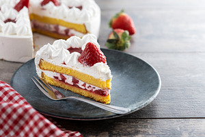 Slice of strawberry cake with fresh strawberries, a Food & Drink Photo by etorres69