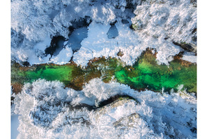 Aerial view of bright green river, a Nature Photo by den-belitsky