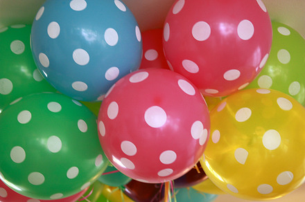 Party balloons containing balloons, polka dots, and pink dots