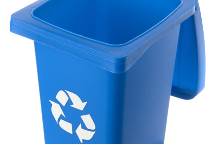 Plastic blue trash can isolated on white background