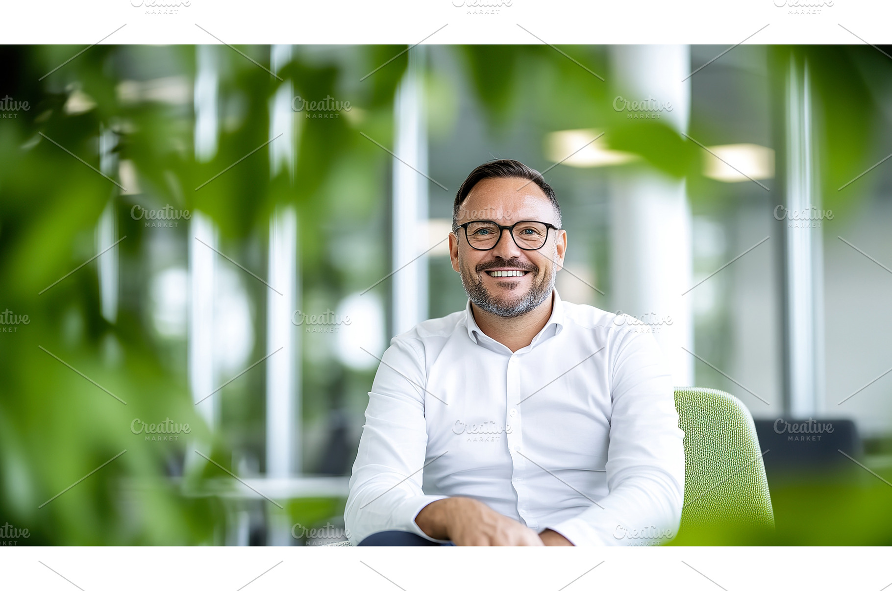 Smiling Man with Glasses Sitting in, a Person Photo by Lermont51