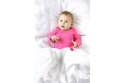 Baby toddler plays in the crib, a Person Photo by yanadjana