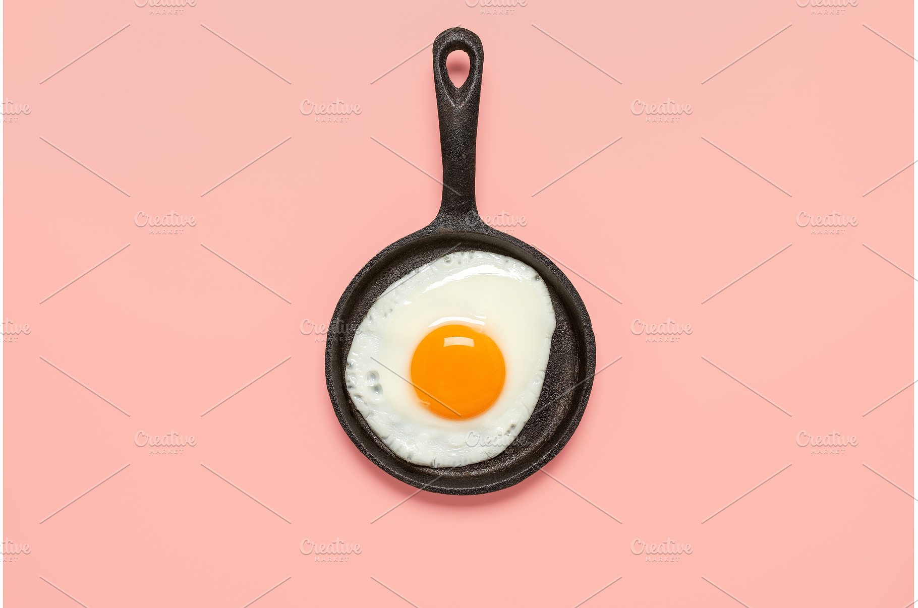 Fried egg in a frying pan on a, a Food & Drink Photo by Yulia71