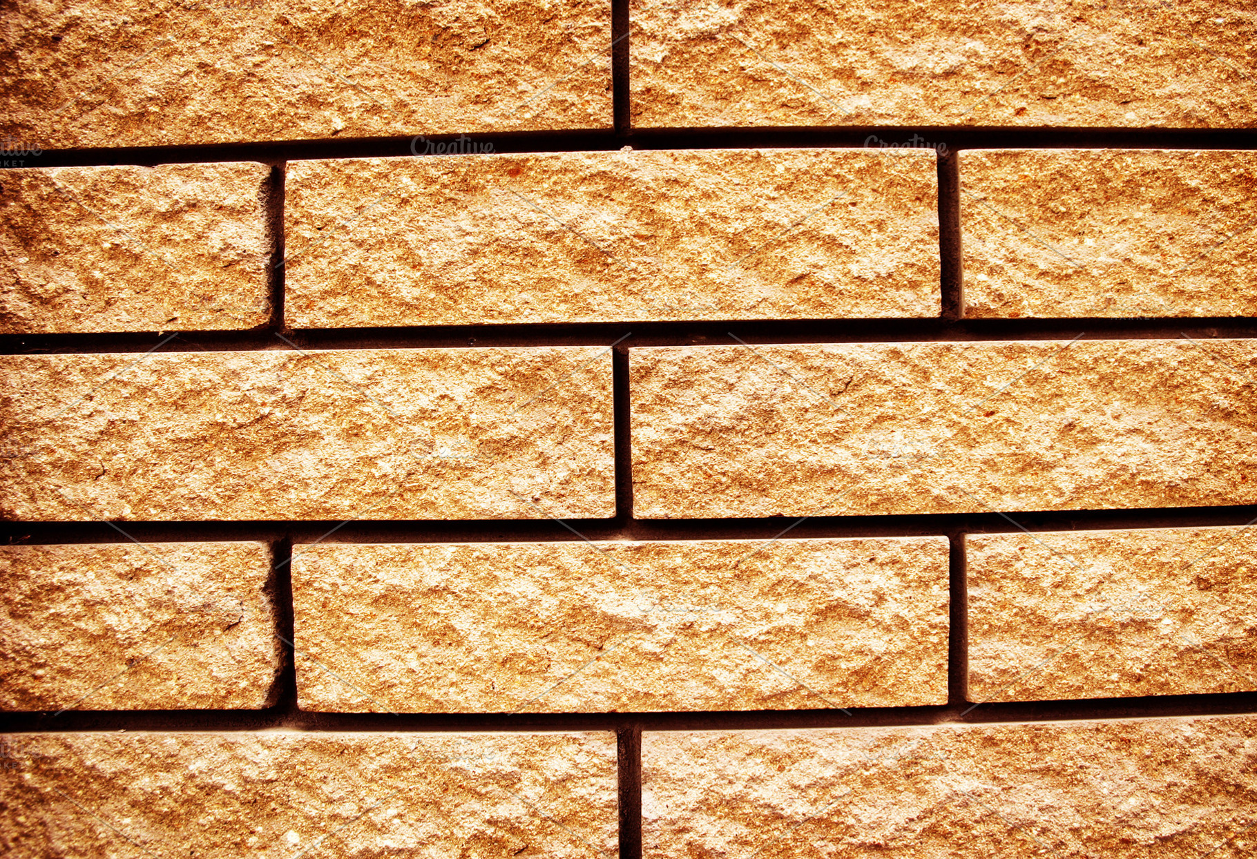 Yellow grunge texture of brickwall, a Photo by saiko3p