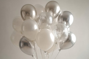 Balloons in silver and white cluster, a Photo by Beautiful things