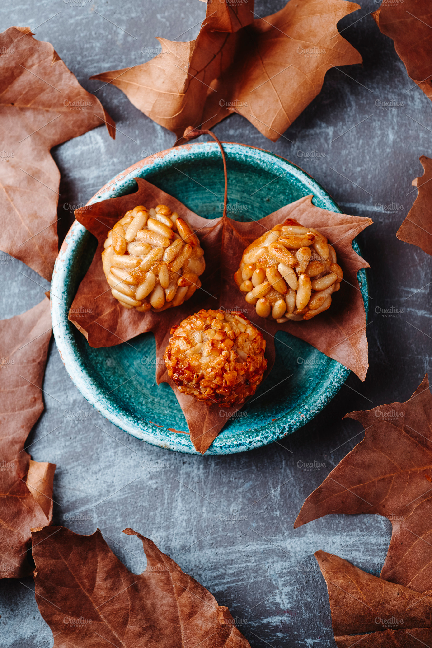 rustic green plate with Catalan panellets, a Photo by Nito