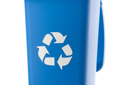 Plastic blue trash can isolated on white background