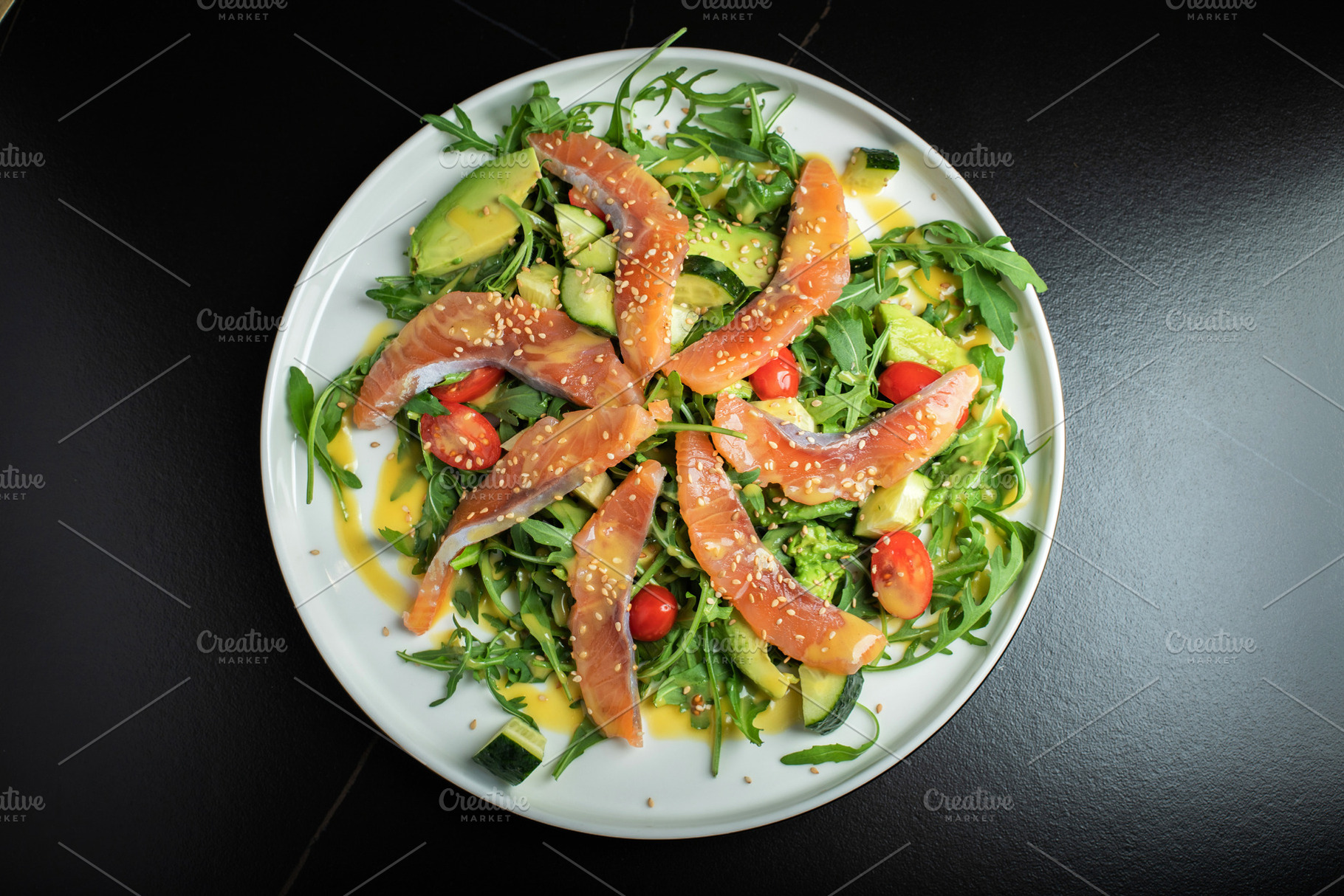 Salad with salted salmon and arugula, a Food & Drink Photo by Budarinphoto