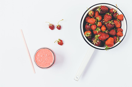 Freshly picked strawberries in colander, a Food & Drink Photo by progressman