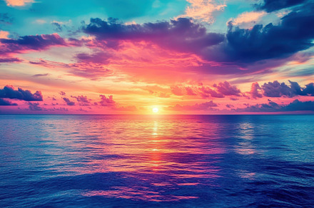 A breathtaking sunset casts vibrant, a Photo by Tanuart