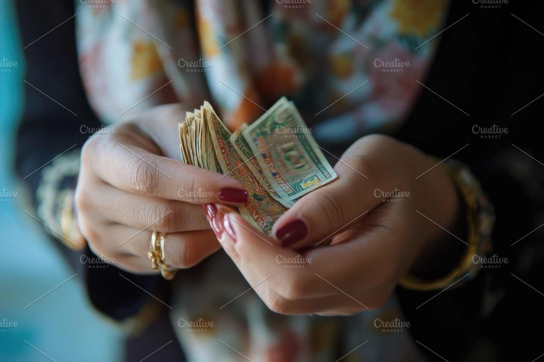 Woman counting AED Dirhams in her ha, a Photo by Iftikhar Alam