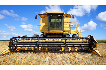 Combine Harvester in the fields of, an Industrial Photo by Web Engine Design