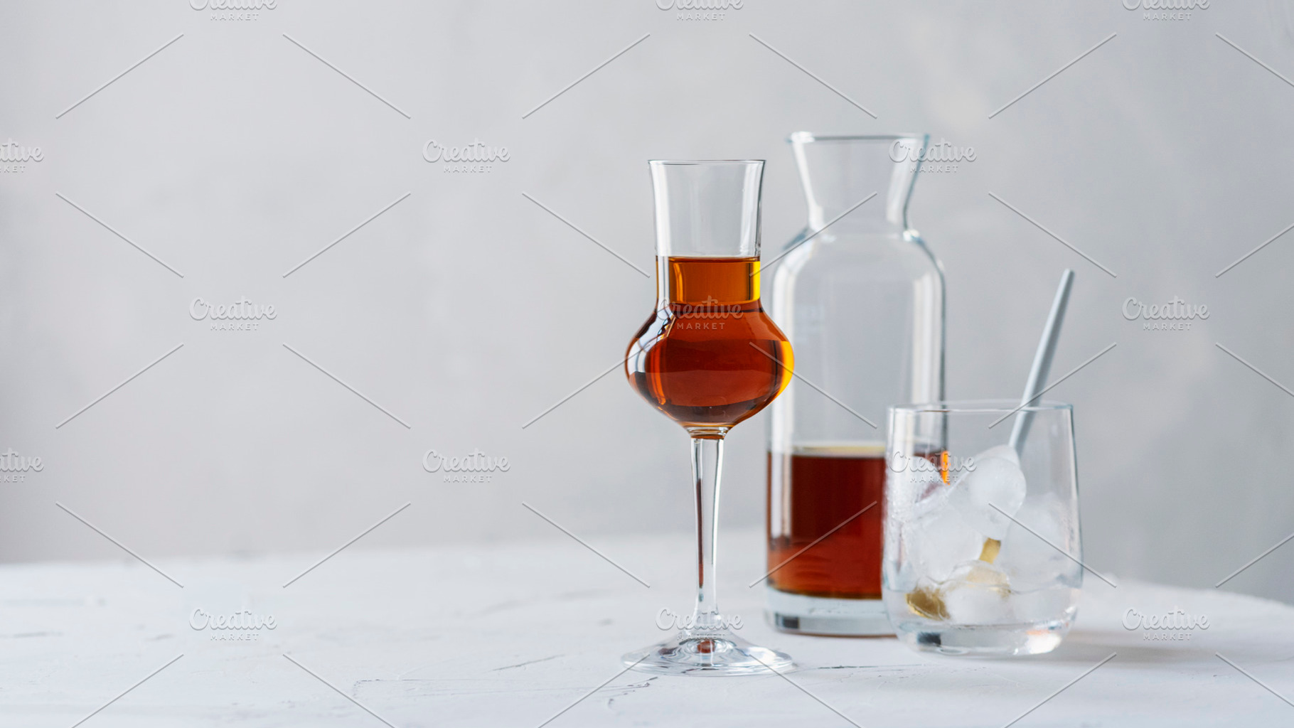 A shot of a strong ligueur with ice featuring selective focus, copy space, a Food & Drink Photo by oxana.denezhkina