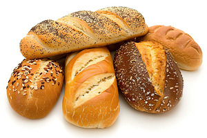 Different kinds of baked bread on white background, a Food & Drink Photo by AlyaAnd