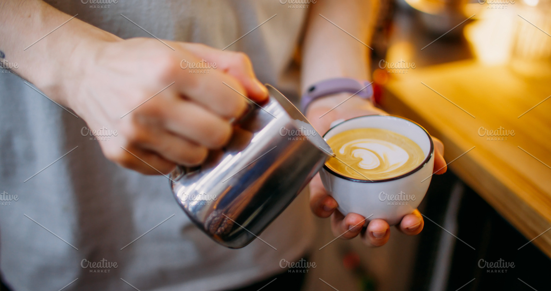 Latte art coffee shop barista hand pouring milk, a Food & Drink Photo by Photo Drive Studio