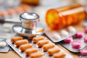 Colorful pills and capsules with stethoscope, a Health & Medical Photo by AlyaAnd