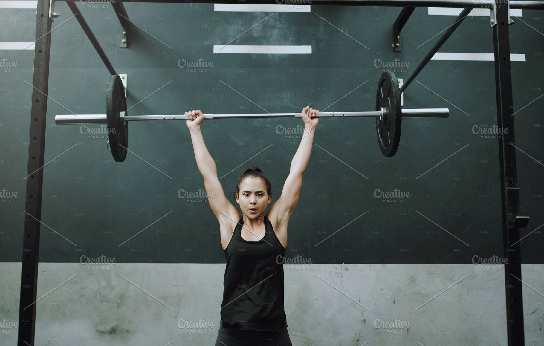 It takes dedication to become this strong, a Photo by Peopleimages.com