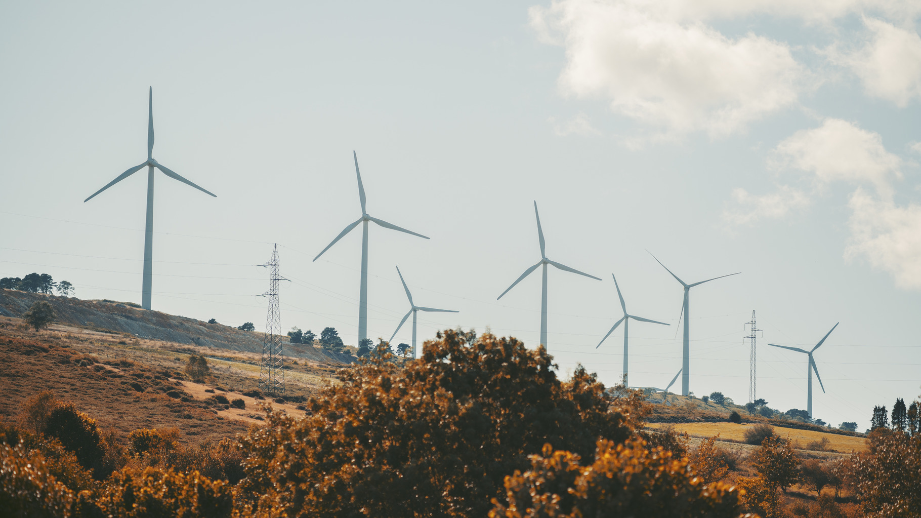 Autumn wind farm hillside view, an Industrial Photo by SkyNext
