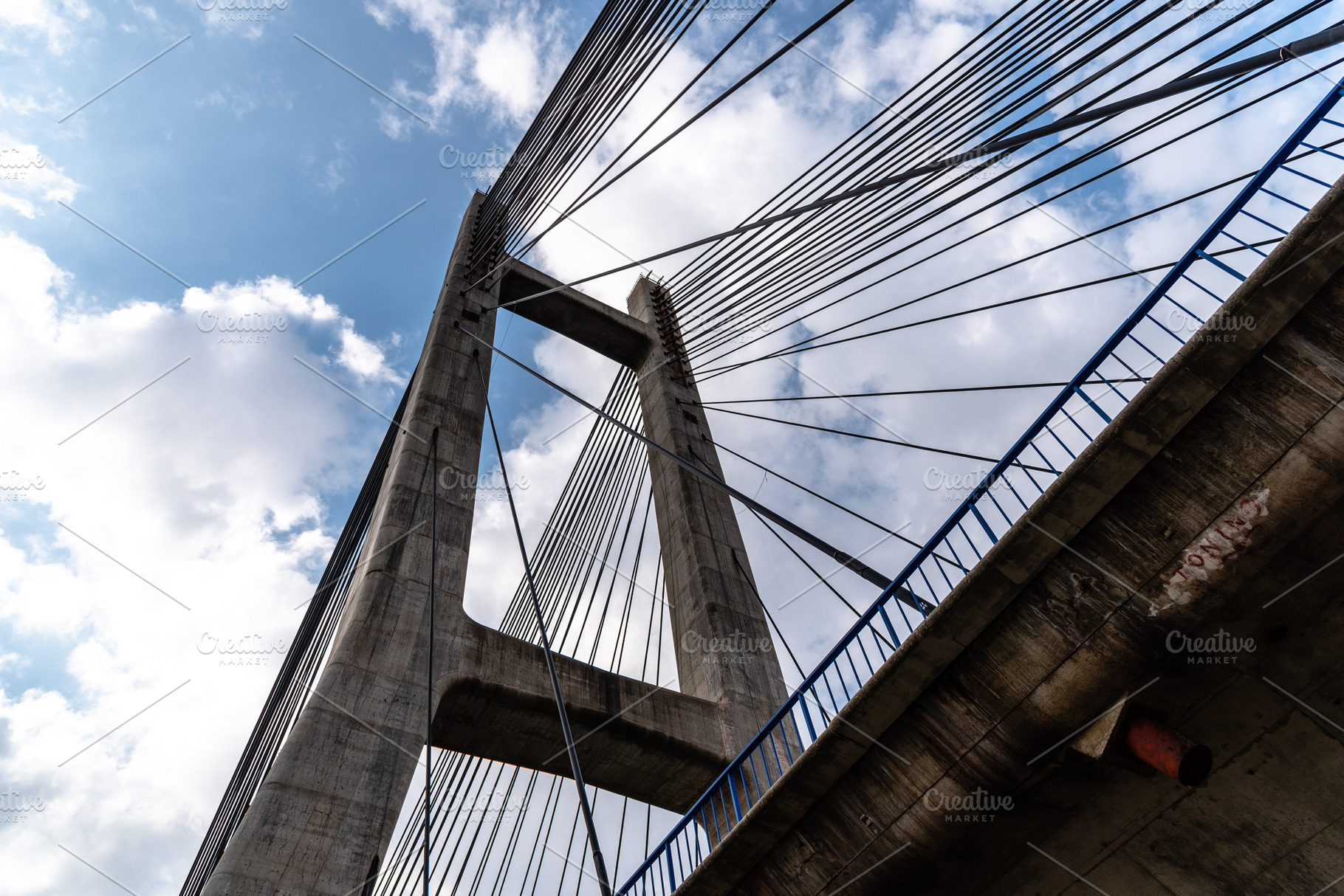 Modern suspension bridge featuring barrios de luna, highway, and leon, an Architecture Photo by Architect´s eye