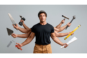 Muscular Multi-Armed Builder with, an Industrial Photo by piter.goskov