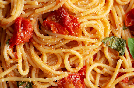 Homemade Spaghetti Pasta with Fresh Tomato Sauce, top view. Flat, a Food & Drink Photo by LiudmylaChuhunova