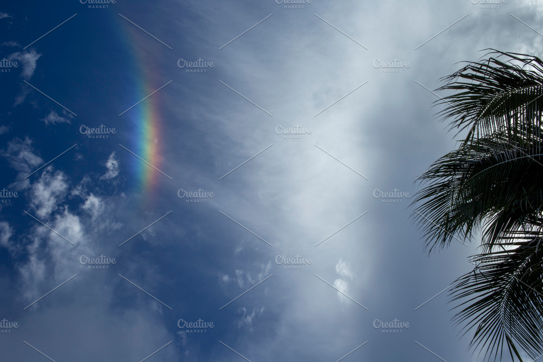 Clouds And Rainbow Background