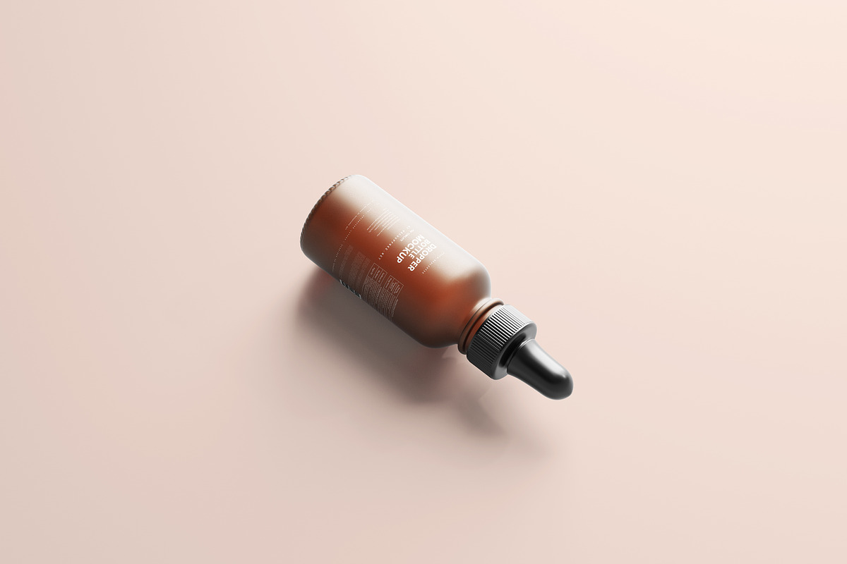 Frosted Glass Dropper Bottle Mockups, a Packaging Mockup by MockupFree.Net (Photo 4 of 6)