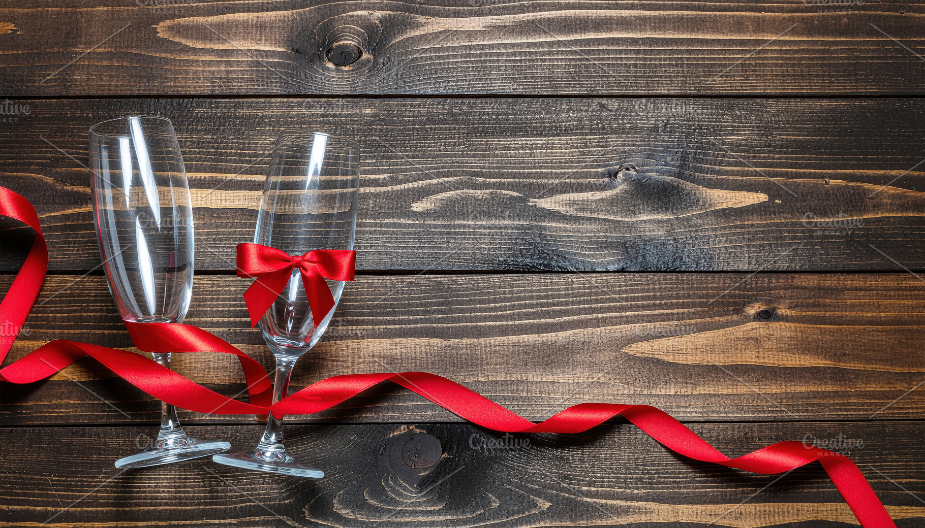 Champagne Glasses with Red Ribbon on Wooden Table, a Food & Drink Photo by Davizro's Market
