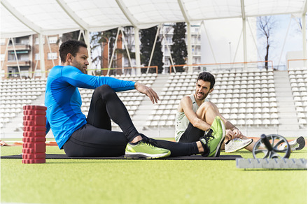 Athletes Stretching in Athletic, a Person Photo by nunezimage
