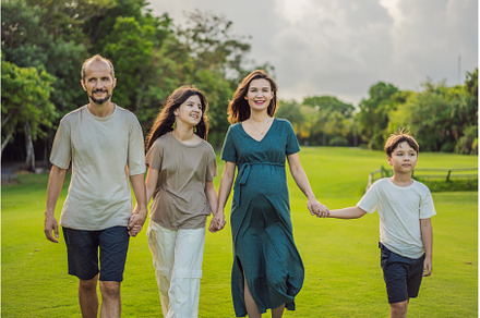 A loving family enjoying a leisurely, a Person Photo by Elizaveta Galitskaya