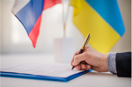 Signing document between Russia and, a Business Photo by HalfPoint