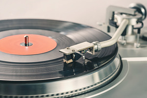 Vintage record player containing turntable, vintage, and technology