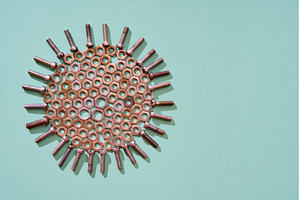 Circular Bolts and nuts pattern with, an Industrial Photo by Gladkov photography