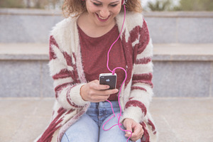 Woman enjoying music stock photo containing woman and beautiful