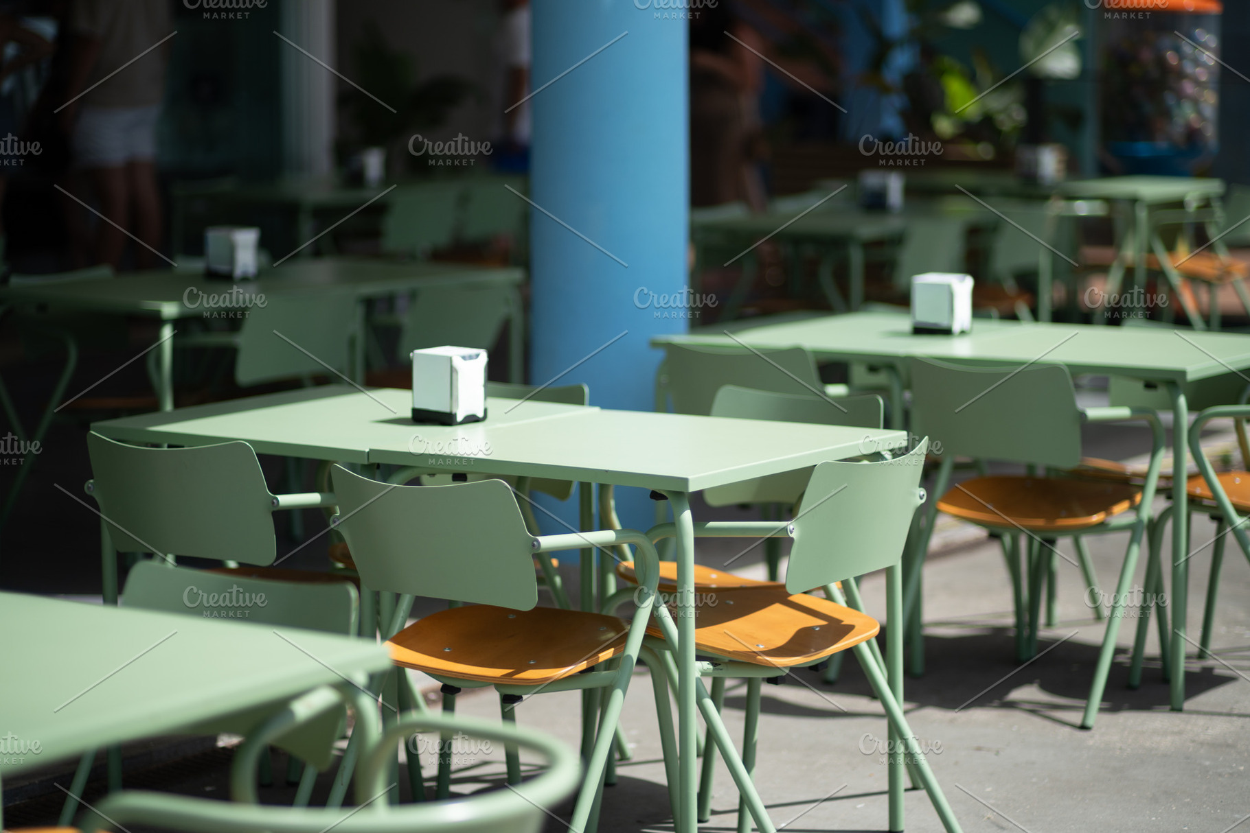 Sage Green Tables on a Cafe Terrace, a Food & Drink Photo by SkyNext