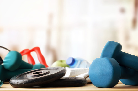 Sport equipment on wooden table in gym, a Sports & Recreation Photo by Davizro's Market