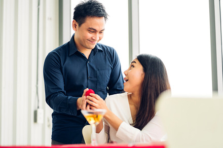 Young handsome romantic asian man giving diamond ring for surpri, a Person Photo by Art_Photo