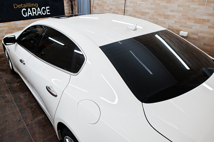 White new luxury sport car in detailing garage., a Transportation Photo by AS photostudio