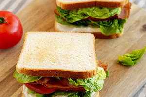 Homemade BLT (Bacon Lettuce Tomato) Sandwich with Mayo, side vie