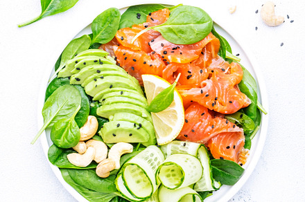 Salmon salad for ketogenic diet with avocado, spinach, cucumber,, a Food & Drink Photo by 5PH