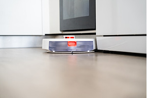 Robot vacuum cleaner cleaning floor, a Technology Photo by volodymyrshtun13795