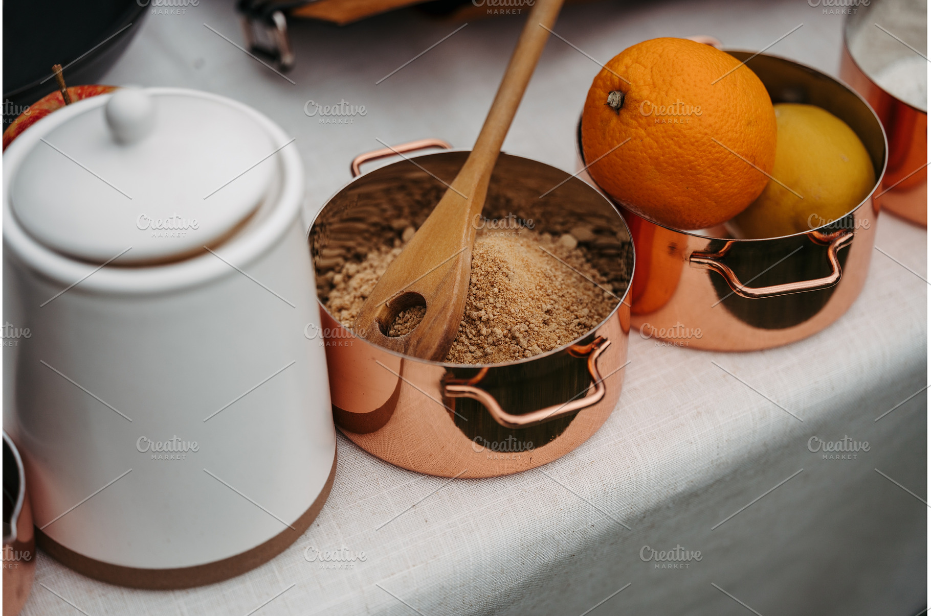 Fresh ingredients in copper pots, a Food & Drink Photo by HalfPoint