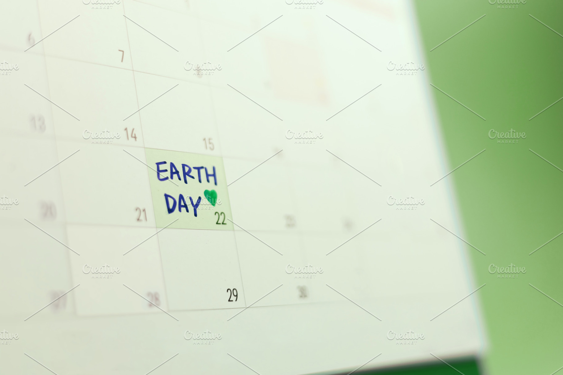 Calendar marked Earth Day on April 22 highlighting environmental, a Photo by salmon.black